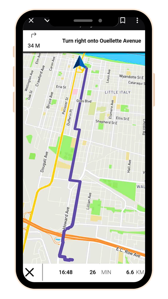 An illustrated mockup shows WindsorEssexCycling.ca open on a mobile phone, the directions for a bike route from downtown to Devonshire Mall on display.